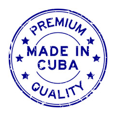 Grunge blue premium quality made in Cuba round rubber seal stamp on white background