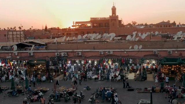 MARRAKECH, MOROCCO - MAY 15 2019: Djemaa El-fna at Marrakech, Morocco. Top view of the UNESCO square on ramadan kareem on sunset