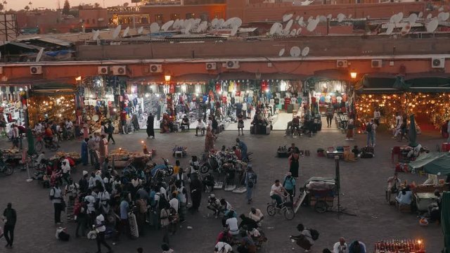 MARRAKECH, MOROCCO - MAY 15 2019: Djemaa El-fna at Marrakech, Morocco. Top view of the UNESCO square on ramadan kareem on sunset