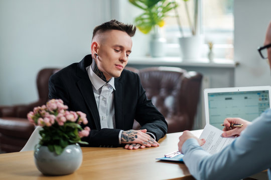 Alternative man attending job interview
