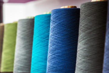 different colors of thread, textile, for clothing manufacture or in the shop