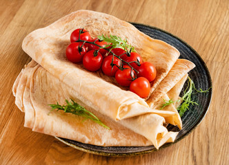 pita bread with spice and cherry tomatoes