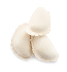 Tasty raw dumplings on white background, top view