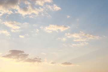 sun rays and cumulus clouds