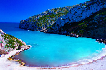 Obraz premium Beach of Granadella one beach in Spain very famous beach in The Mediterranean sea with turquoise waters
