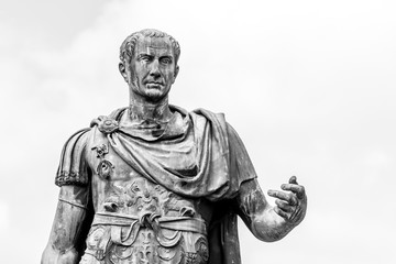 Statue of Roman Emperor Julius Caesar at Roman Forum, Rome, Italy - obrazy, fototapety, plakaty