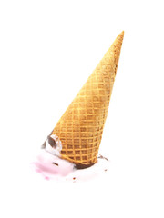 melting ice cream in cone on white