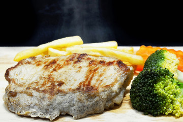 grilled steak with french fries