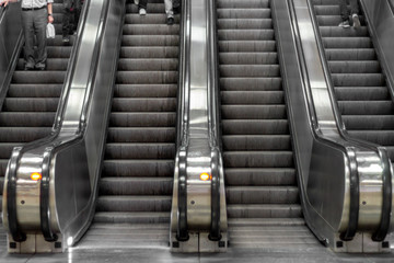 Escalator - subway, shopping mall and business center escalator - moving staircase