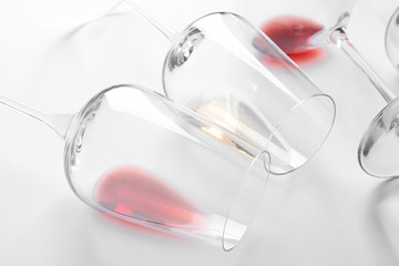 Glasses with different wine on white background, closeup