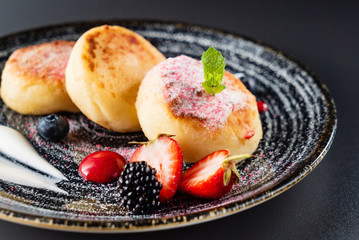 soft cheese pancakes with berries