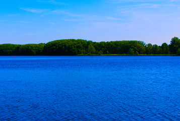 park surrounded by blue waters