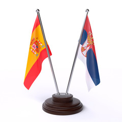 Spain and Serbia, two table flags isolated on white background. 3d image