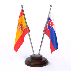 Spain and Slovakia, two table flags isolated on white background. 3d image