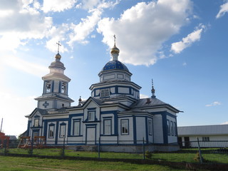 Fototapeta na wymiar View of the village wooden church in the village of Lutsk Chuvashia