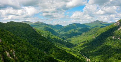 Wide view of the Blue Ridge Mountains, seen from Chimney Rock Mountain in North Carolina - 269575792