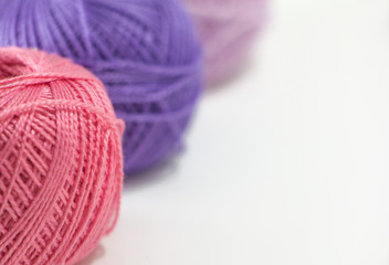 Pink thread close-up.  Violet and pink shades. 