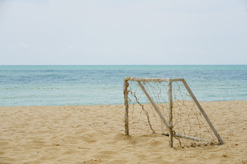 Beach football goal on a sunny day this is popular sport on the beach
