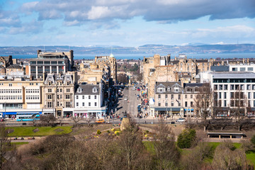 Fototapeta na wymiar Edinburgh city centre on a sunny winter day. The firth of Forth is visible in background