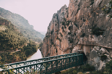 Bridge over de river among rock mountains in south of Spain