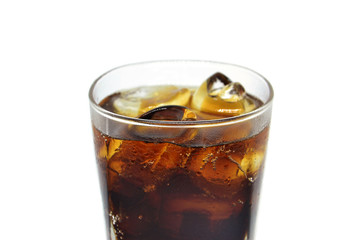 cola in glass with ice on white