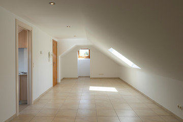 Empty white penthouse with two very bright windows