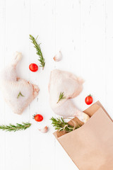 Fresh raw chicken legs with herbs. Cooking concept