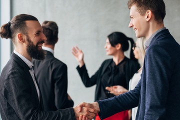 Corporate culture. Business etiquette. Greeting handshake. Partners meeting Professional relationship