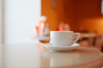 wooden table white Cup and saucer side view
