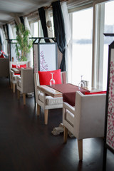 the interior of cafe in bright colors