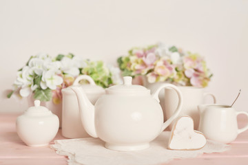 Fototapeta na wymiar tea and coffee set on the table on a white background