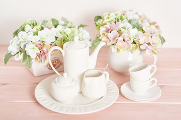tea and coffee set on the table on a white background