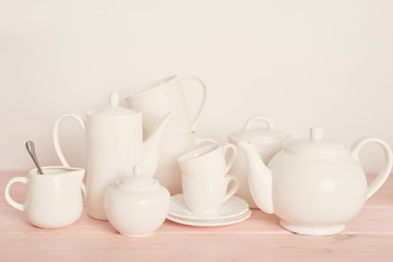 Fototapeta na wymiar tea and coffee set on the table on a white background