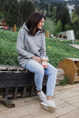 Fototapeta premium nice mature woman happy in a coffee moment 