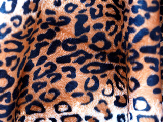 Closeup Leopard leather fabric background.
