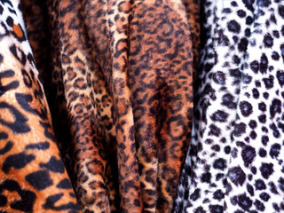 Closeup Leopard leather fabric background.