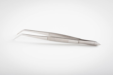 isolated tweezers in white background