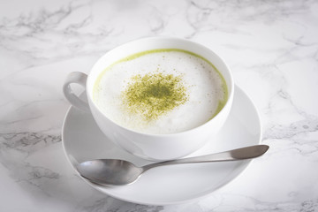matcha latte image on marble background