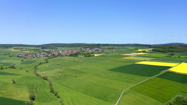 Aerial view, flight over agriculture with cereal fields and rapeseed cultivation, Usingen, Schwalbach, Hochtaunuskreis, Hesse, Germany