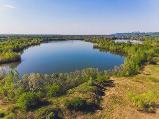 Naklejka na ściany i meble Field and river in summer, shooting from a quadcopter.