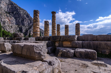 Delphi, Phocis / Greece. Temple of Apollo at the archaeological site of Delphi visible today date from the 4th century BC, and are of a peripteral Doric building.