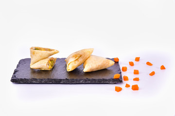 Tasty homemade samosa. White background