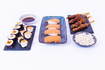 Sushi rolls, rice, cream cheese. Asian food frame. Dinner party.