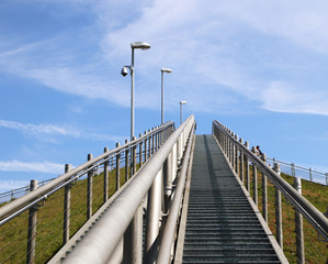 MUNICH, GERMANY - View of the Munich Airport visitor park: the staircase to the visitor observation hill with an open view over the airport and the aircraft runways