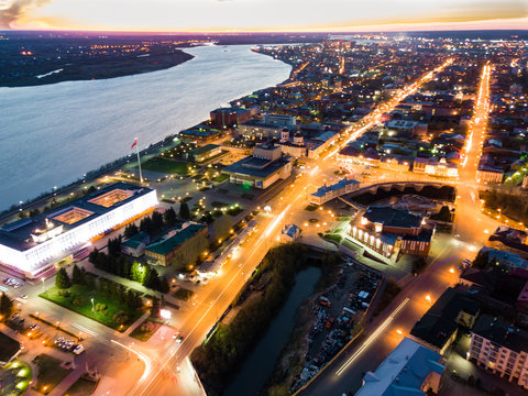 Tomsk nigth illumination. Cityscape Aerial view of Tom river. Siberia, Russia.