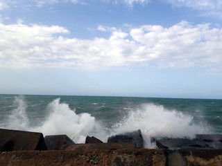 waves crashing on rocks