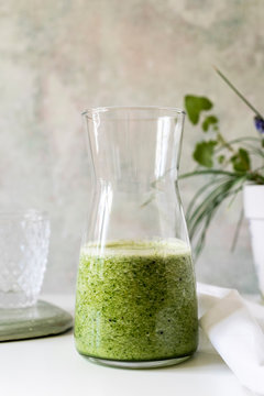 Healthy green smoothie spinach, apple avocado cucumber and kiwi with lemon juice. Super food, detox and healthy food