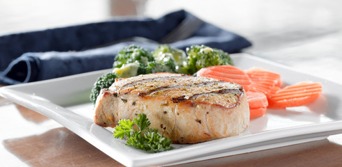 Pork loin filet with carrots andbroccoli with hollandaise sauce