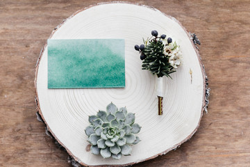 emerald card, succulent and a small bouquet