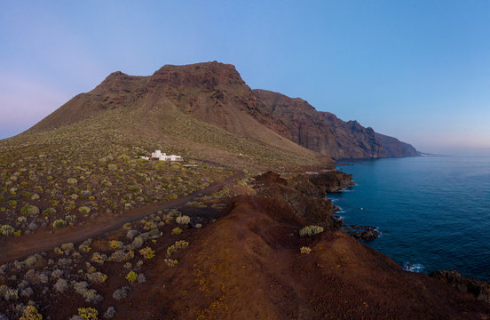 Coastline with majestic cliffs and dark waves
